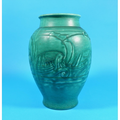 232 - A Royal Lancastrian baluster shaped vase, green glaze with relief decoration of galleons, No 3356, 9... 