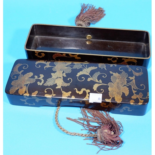 236a - A Japanese black lacquer rectangular box decorated in gilt with flowers and foliage, with woven and ... 