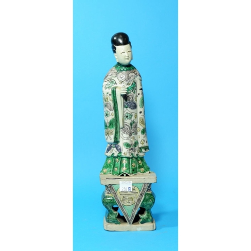 238b - A Chinese porcelain figure of a scholar in the famille verte palette, height 12