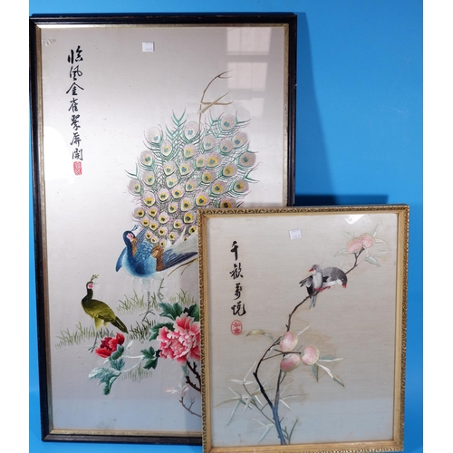 240a - A 20th century Chinese silk embroidery depicting a peacock, etc., 28.5