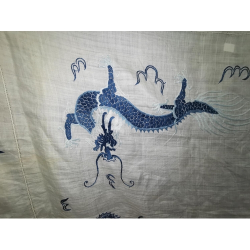 241b - A Chinese large linen tablecloth decorated with 2 dragons in blue embroidery