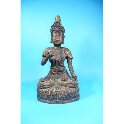 256 - An 18th/19th century Chinese bronze Buddha figure with gilded and painted decoration, inset jewelled... 