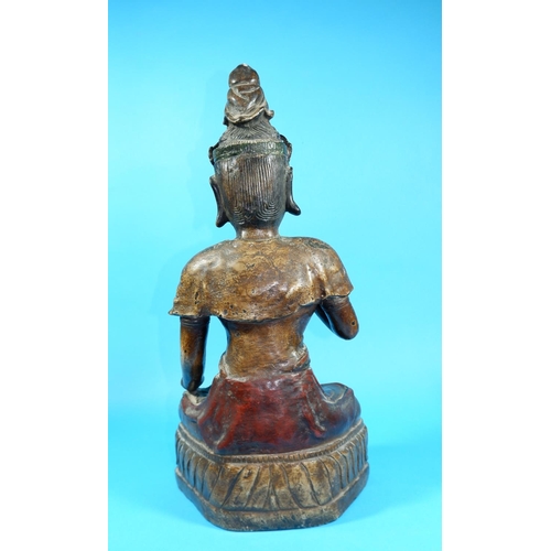 256 - An 18th/19th century Chinese bronze Buddha figure with gilded and painted decoration, inset jewelled... 