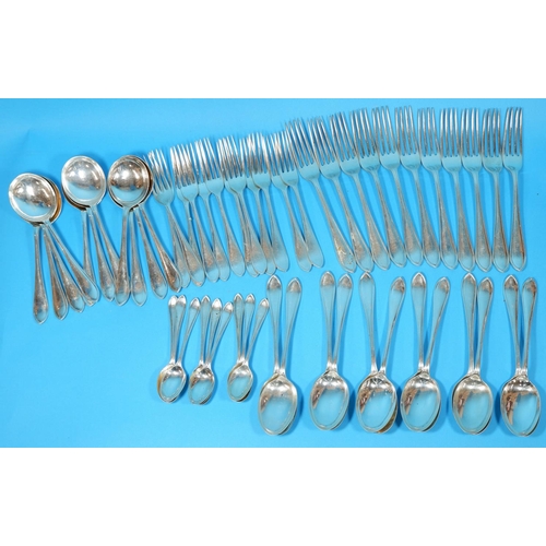 300 - A canteen of hallmarked silver cutlery with reeded rims and pointed terminals, comprising 11 dinner ... 