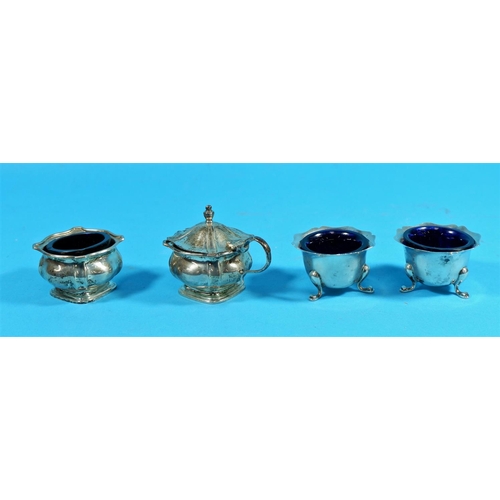 305 - A pair of silver salts, blue glass liners, Birmingham 1910; another pair of silver cruets