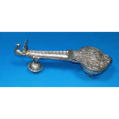 363 - An Indian white metal trinket box in the form a sitar with peacock finial, 5.83oz.