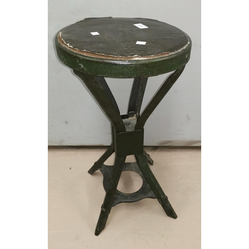 621 - A 1920's industrial stool in green painted steel