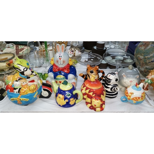 165 - A collection of novelty cookie jars