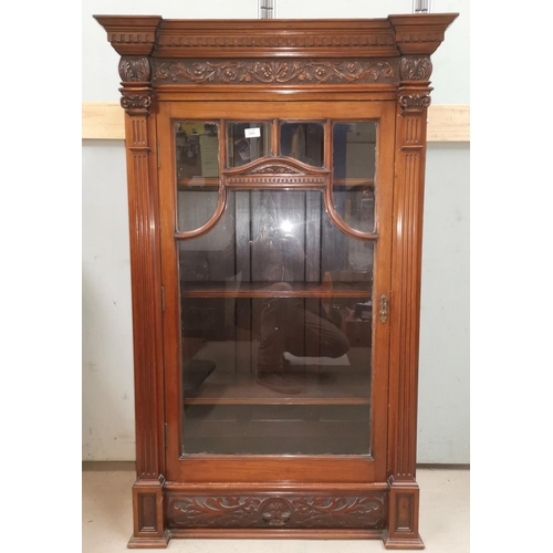545 - An Edwardian walnut side cabinet with dentil cornice and carved frieze, square Doric side pillars, s... 