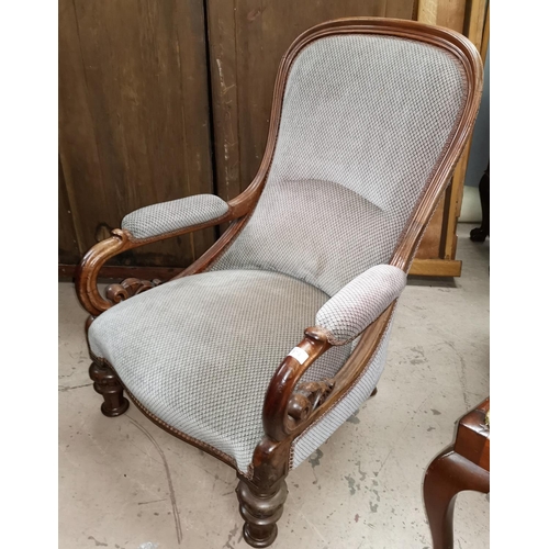 576 - A Victorian mahogany spoonback scroll arm chair in grey fabric