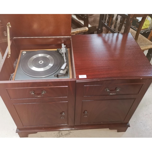 580 - A mahogany period style stereo cabinet, including stacking system, Garrard deck & LP records