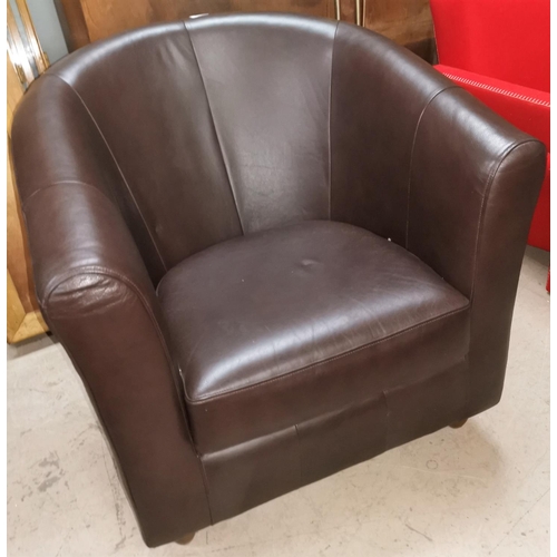 589 - A brown leather tub shaped armchair; an early 20th century striking wall clock; a 1930's workbox/occ... 