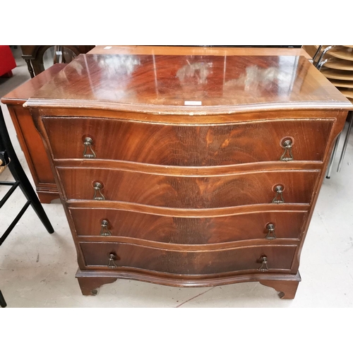 598 - A mahogany reproduction chest of 4 long drawers with serpentine front