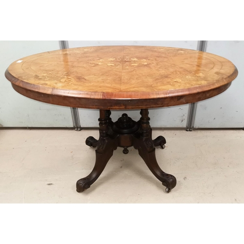 638 - A Victorian quarter veneered walnut oval top loo table with floral marquetry inlay, quadruple turned... 