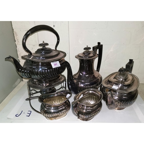 334A - A Victorian EPNS Regency style tea kettle on stand; a similar style 3 piece tea service; a coffee po... 