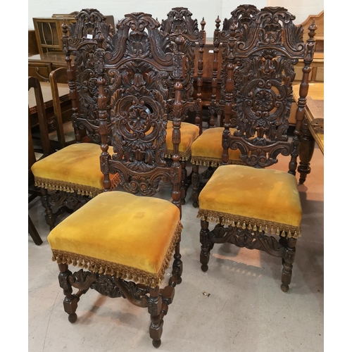 533 - A set of 4 19th century Carolean style oak dining chairs, with extensively caved high backs