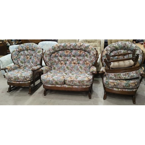 579 - An Ercol style 4 piece cottage suite with wooden frames and floral tapestry upholstery, comprising 2... 