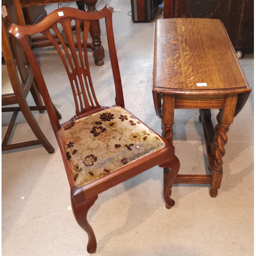 586 - A 1930's oak drop leaf dining table on barley twist legs; 2 18th century style mahogany dining chair... 