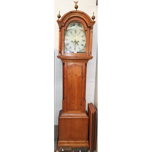 605 - A 19th Century longcase clock, arch top hood with turned pillars and brass finials, quarter reeded c... 