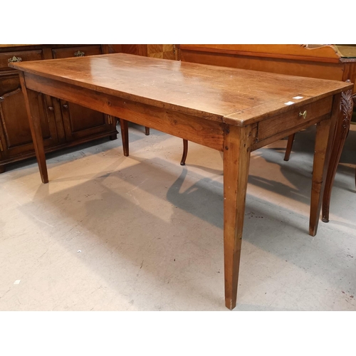 641 - An 18th century French Provincial rectangular oak dining table with end drawer and square tapering l... 