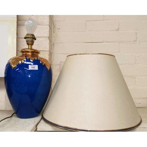 166 - A 1980's ovoid table lamp by Louis Drimmer, in powder blue with raised gilt leaf decoration, with sh... 