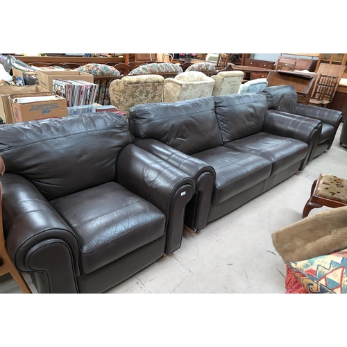 627 - A modern 3 piece lounge suite in brown leather comprising 3 seater settee and a pair of matching arm... 