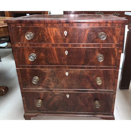 546 - A Georgian mahogany commode with hinged folding top and front, and false drawer fascias