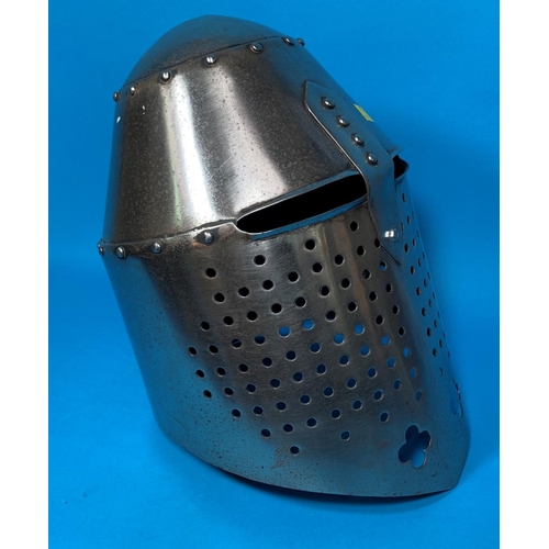 389A - A pierced and riveted steel Great Helmet reproduction