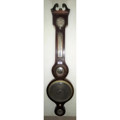 423 - A 19th century mahogany cased mercury column barometer with level mirror, thermometer and hygrometer