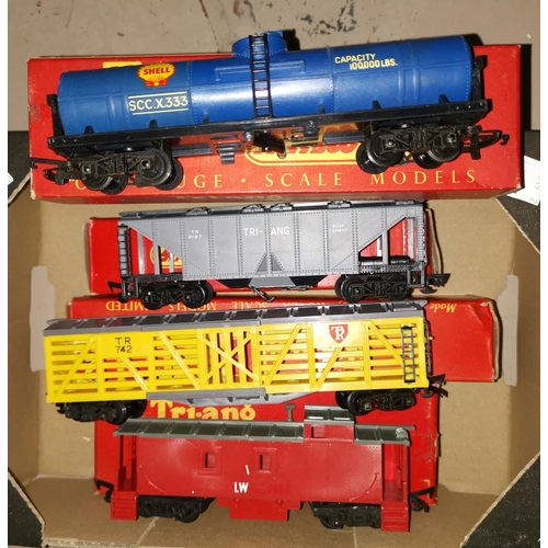 459A - 4 originally boxed Triang 00 wagons R115 Caboose: R126 Stock car: R137 cement car: R117 oil tank bog... 