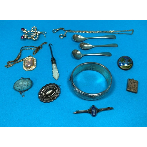 317 - A silver stiff hinged bangle; a 19th century Wedgwood tiepin; other costume jewellery; etc.