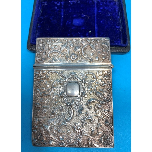 324 - A William IV silver card case with extensive relief scroll, acanthus and bird decoration, Birmingham... 