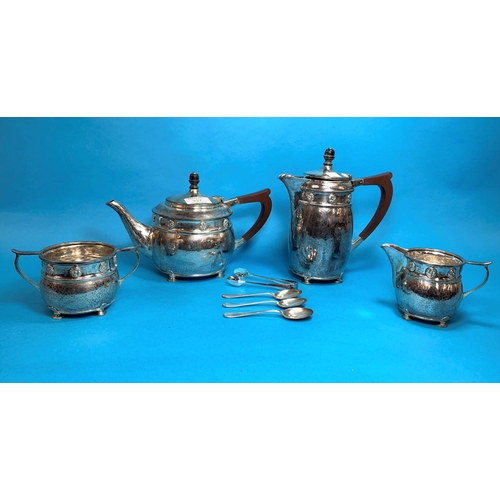 337 - A silver 4 piece tea set, circular planished form with embossedmrosette mounts, on 4 pad feet, Birmi... 