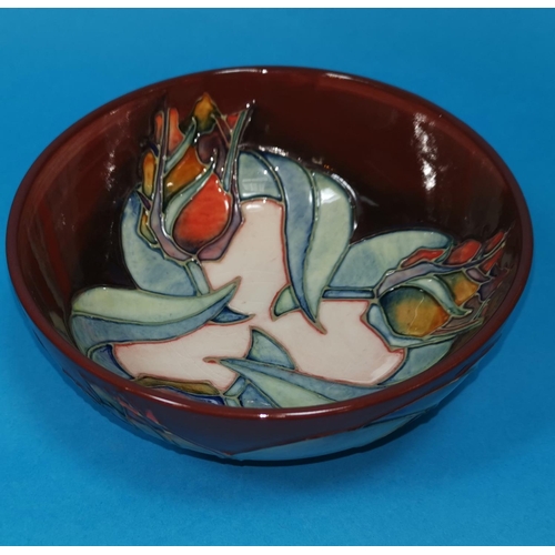 186 - A Moorcroft ceramic bowl, monogrammed to base 'WM & DH', diameter 16 cm