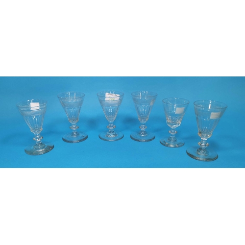 209 - A set of 19th century slice cut wine glasses with diamond cut band, 11 cm; a similar glass