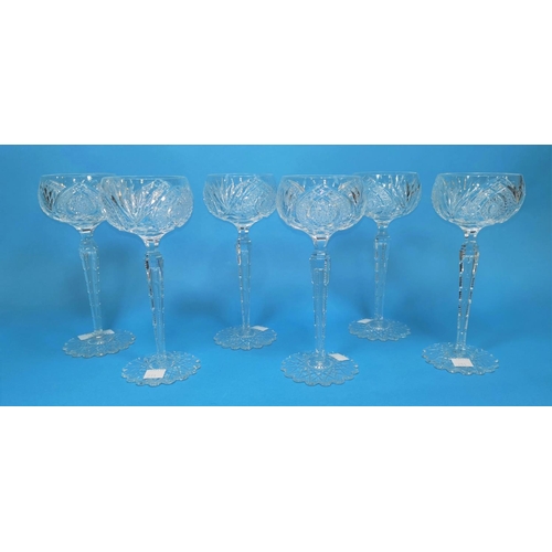 211 - A set of 6 1920's cut hock glasses with faceted hollow stems, star and petal cut bases