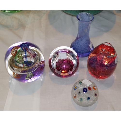 217 - Three Caithness paperweights, another dumpy shaped paper wieght and a similar vase