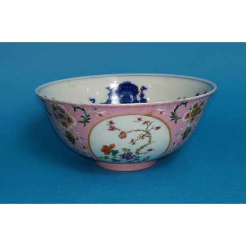 252 - A Chinese porcelain famille rose bowl with floral decoration, decorated with circular panels, blue &... 