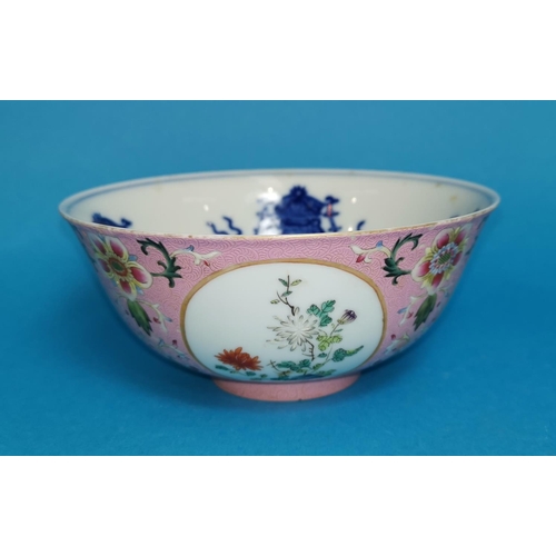252 - A Chinese porcelain famille rose bowl with floral decoration, decorated with circular panels, blue &... 