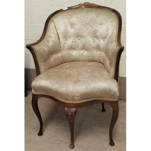 525 - An Edwardian 5 legged chair with inlaid decoration, 3 front and 2 back legs, in floral cream upholst... 