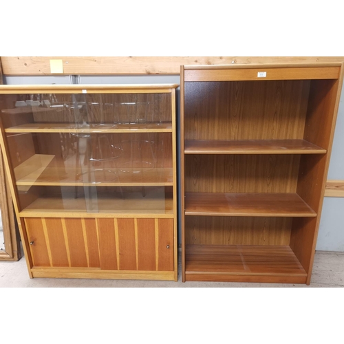 530 - A 1960's teak 3 height bookcase; a 1950's light oak bookcase enclosed by 2 glass and 2 panelled slid... 