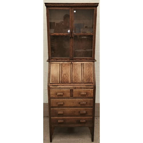 547 - A 1930's oak narrow bureau/bookcase
