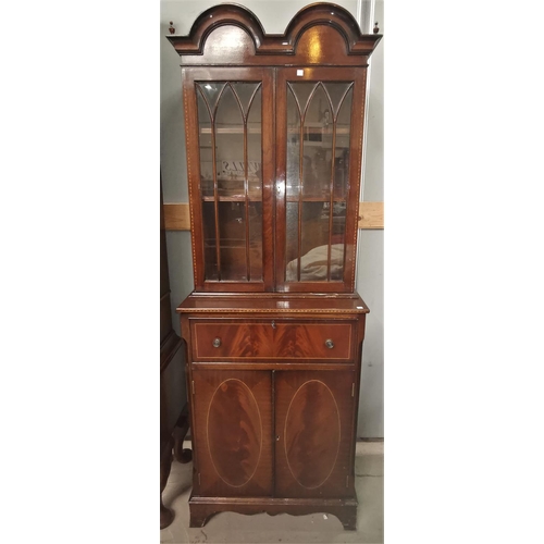 554 - An inlaid mahogany secretaire bookcase with astragal glazed double cupboard over pull out green leat... 
