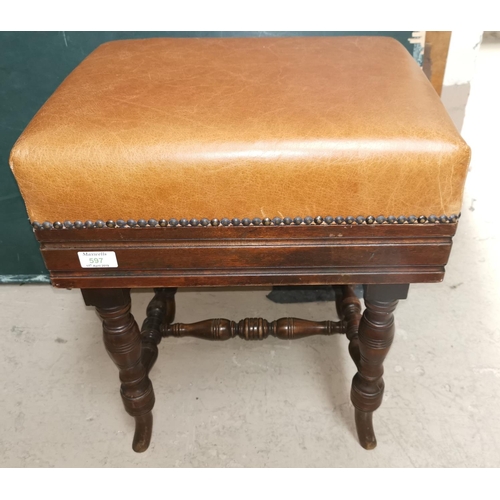 597 - An Edwardian mahogany piano stool, rise and fall action, on turned legs, cushion seat