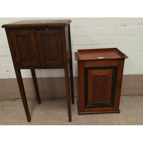 604 - An early 20th century mahogany pot cupboard, enclosed by single door; an oak 2 door sewing cabinet