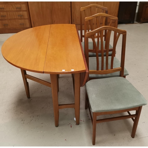 632 - A lightwood circular drop leaf dining table with 3 Nelson Brothers dining chairs