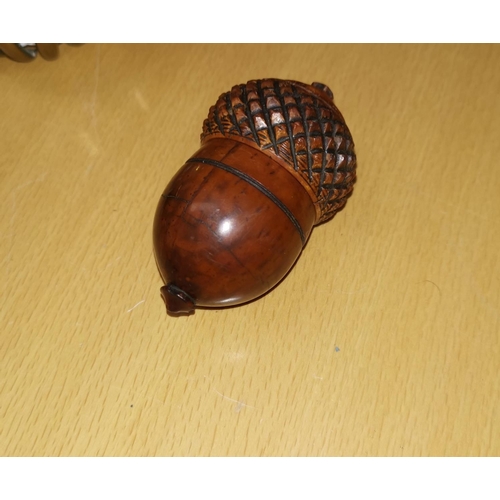 289 - A 19th century carved wood novelty nutmeg grater in the form of an acorn with screw off top, (grater... 