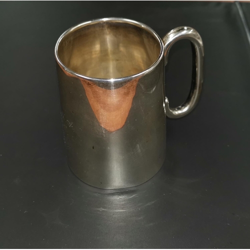 296 - A silvering christening mug of tapering cylindrical form, with loop handle, Birmingham 1936, 2.75 oz