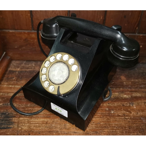 479 - A vintage black Bakelite telephone by A.E.P.