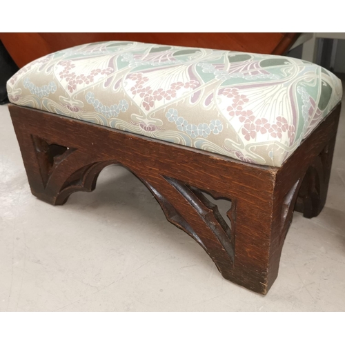 591 - An oak architectural gothic stool with Art Nouveau upholstery, length 21